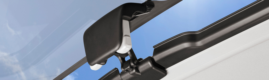 Manual operation using a latch handle.
